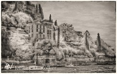 Varenna's Walk of Lovers BW Color - A portion of Varenna's Walk of Lovers (with its distinguishing red fence), as it is cantilevered over the waters of Lake Como. Lake Como, in the Alps of...