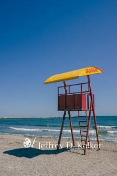 Waiting For Summer An empty lifeguard chair waits for the coming of summer. The chair is located on Modern Beach in Constanta, Romania